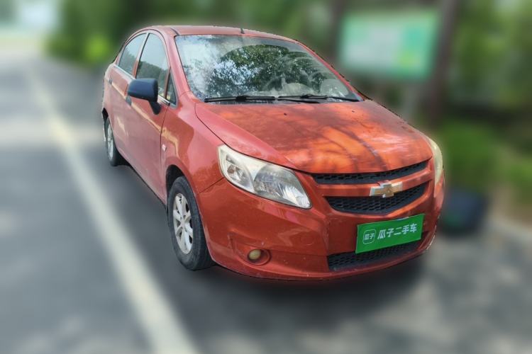 Used Chevrolet Sail 2013 Sedan 1.2L Manual Fashionable Happiness Edition Front Right 45 Deg