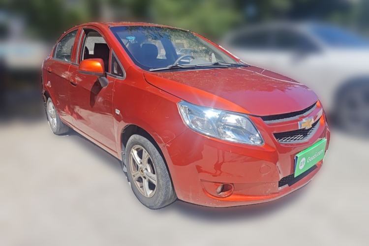 Used Chevrolet Sail 2013 Sedan 1.4L Manual Happiness Edition II Front Right 45 Deg