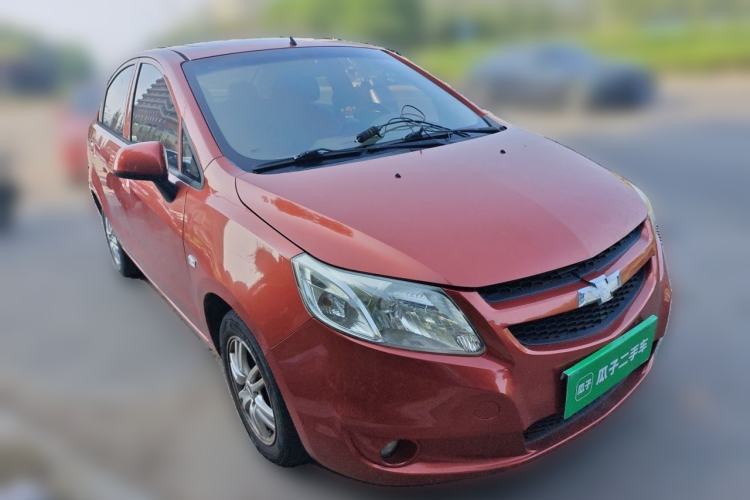Used Chevrolet Sail 2013 Sedan 1.4L Manual Happiness Edition II Front Right 45 Deg