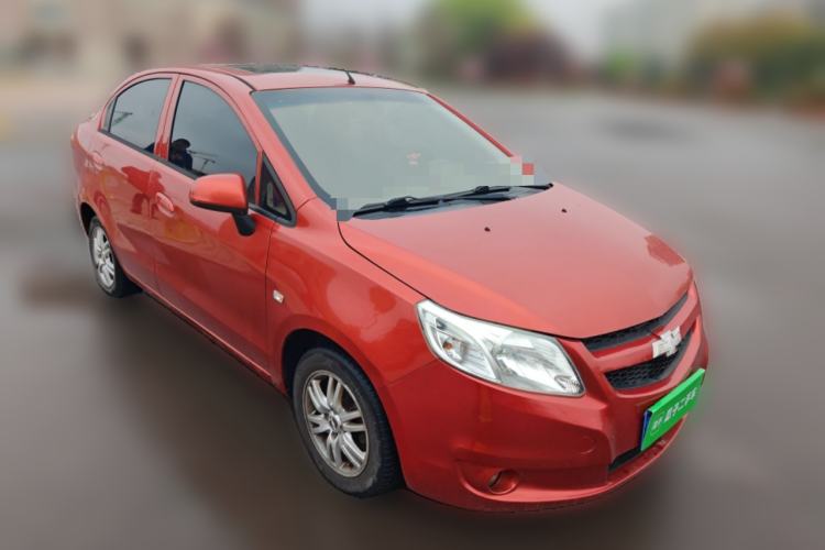 Used Chevrolet Sail 2013 Sedan 1.4L Manual Happiness Edition II Front Right 45 Deg