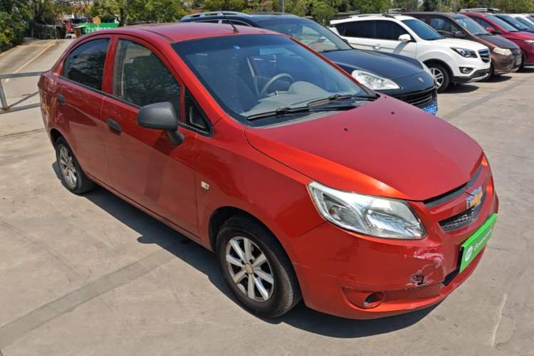 Used Chevrolet Sail 2013 Sedan 1.2L Manual Fashionable Happiness Edition Front Right 45 Deg