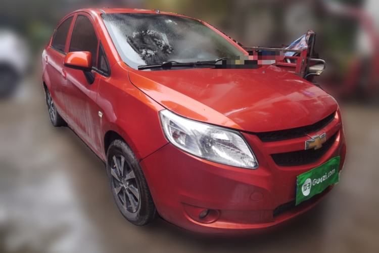 Used Chevrolet Sail 2013 Sedan 1.4L Manual Happiness Edition II Front Right 45 Deg