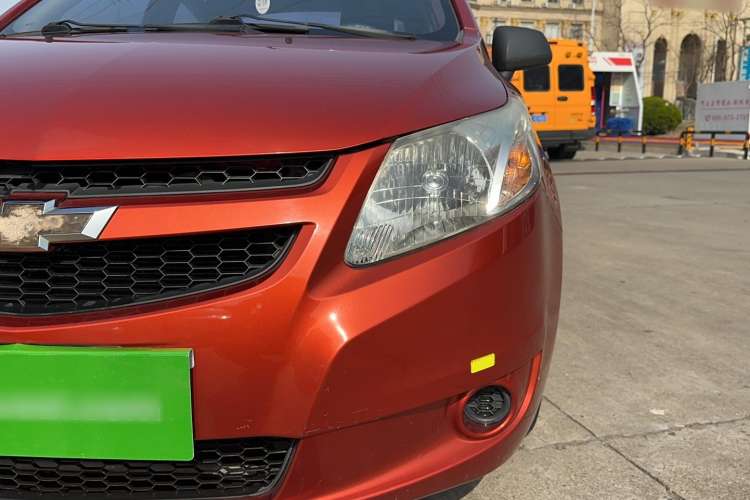 Used Chevrolet Sail 2013 Sedan 1.2L Manual Fashionable Happiness Edition Left Front Headlight