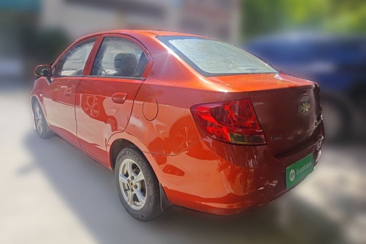 Used Chevrolet Sail 2013 Sedan 1.4L Manual Happiness Edition II Rear Left 45 Deg