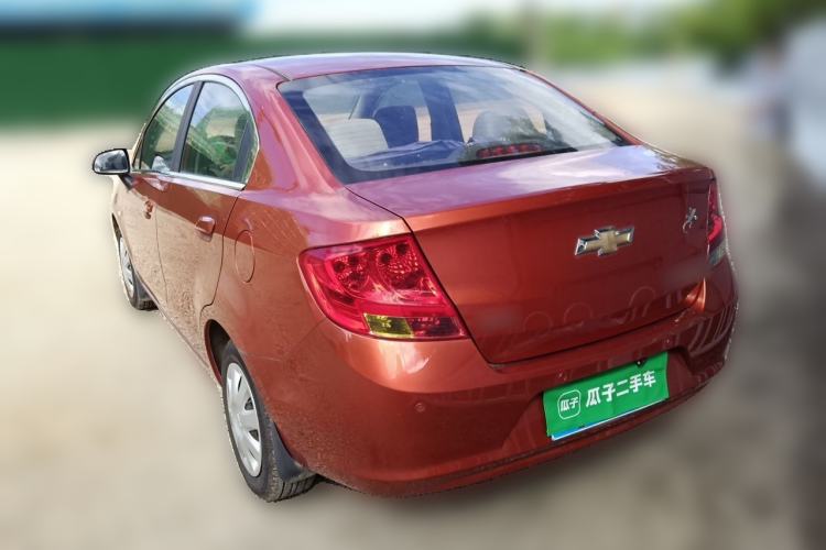 Used Chevrolet Sail 2013 Sedan 1.4L Manual Ideal Happiness Edition Rear Left 45 Deg