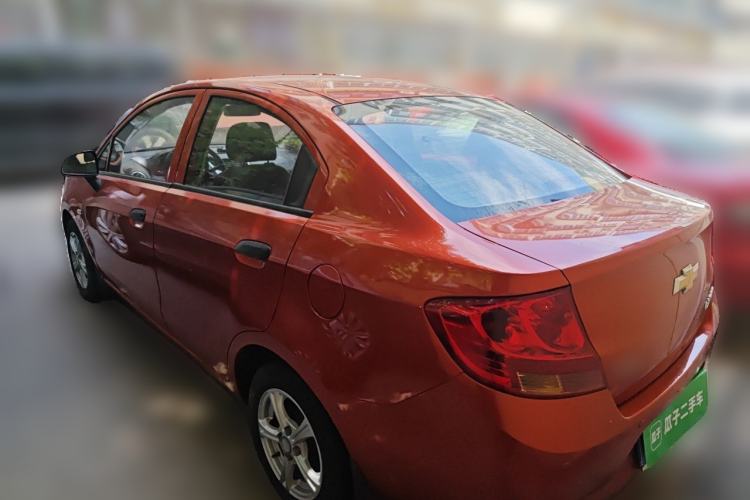 Used Chevrolet Sail 2013 Sedan 1.4L Manual Ideal Happiness Edition Rear Left 45 Deg