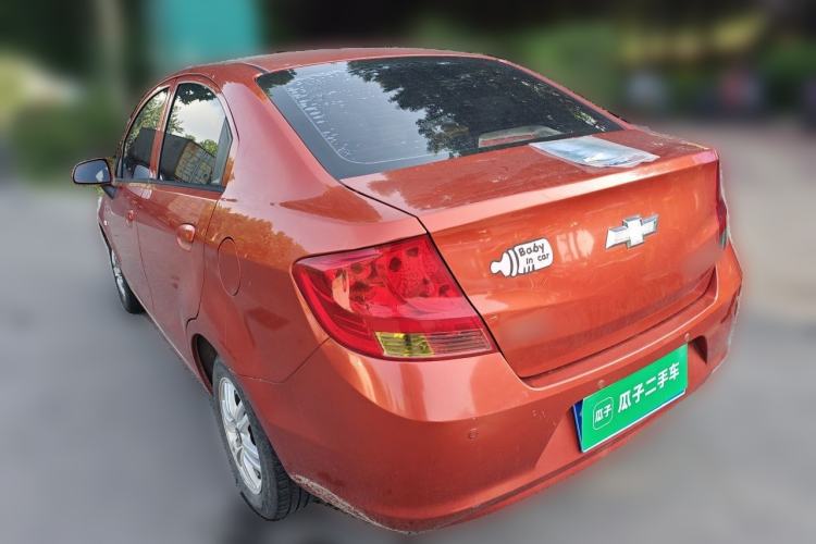 Used Chevrolet Sail 2013 Sedan 1.4L Manual Happiness Edition II Rear Left 45 Deg