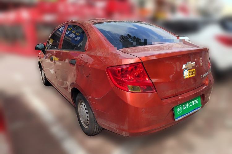 Used Chevrolet Sail 2013 Sedan 1.2L Manual Warm Edition Rear Left 45 Deg