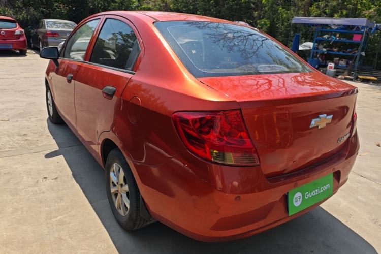 Used Chevrolet Sail 2013 Sedan 1.2L Manual Fashionable Happiness Edition Rear Left 45 Deg