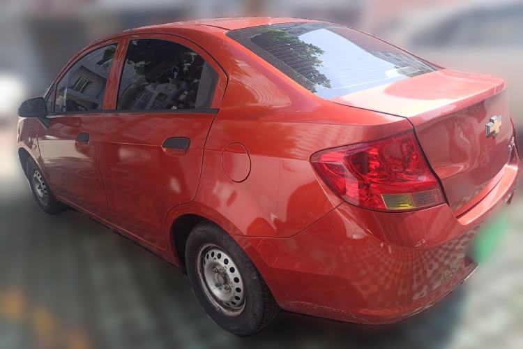 Used Chevrolet Sail 2013 Sedan 1.2L Manual Fashionable Happiness Edition Rear Left 45 Deg