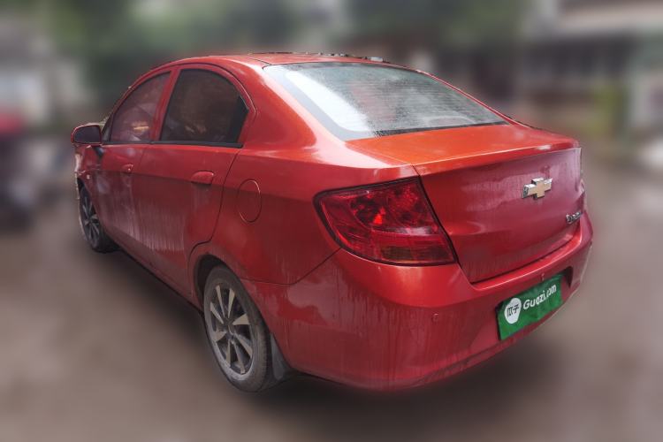 Used Chevrolet Sail 2013 Sedan 1.4L Manual Happiness Edition II Rear Left 45 Deg