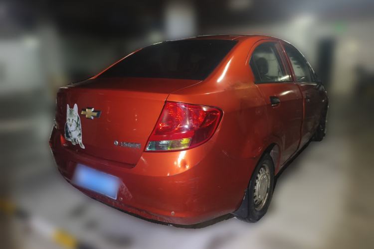 Used Chevrolet Sail 2013 Sedan 1.2L Manual Fashionable Happiness Edition Rear Right 45 Deg