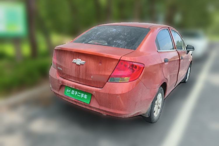 Used Chevrolet Sail 2013 Sedan 1.2L Manual Fashionable Happiness Edition Rear Right 45 Deg