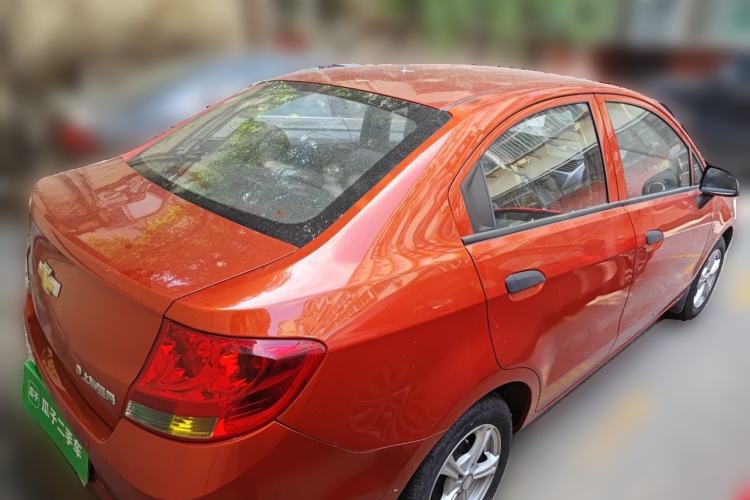 Used Chevrolet Sail 2013 Sedan 1.4L Manual Ideal Happiness Edition Rear Right 45 Deg