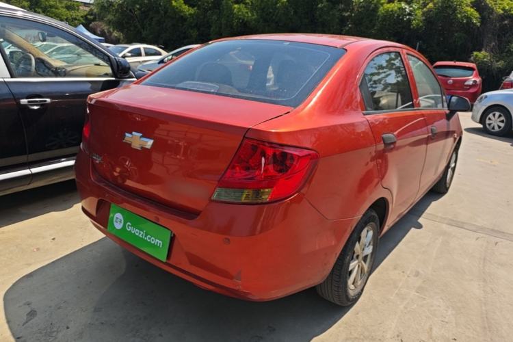 Used Chevrolet Sail 2013 Sedan 1.2L Manual Fashionable Happiness Edition Rear Right 45 Deg