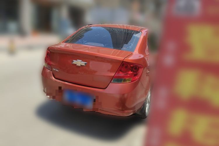 Used Chevrolet Sail 2013 Sedan 1.2L Manual Warm Edition Rear Right 45 Deg