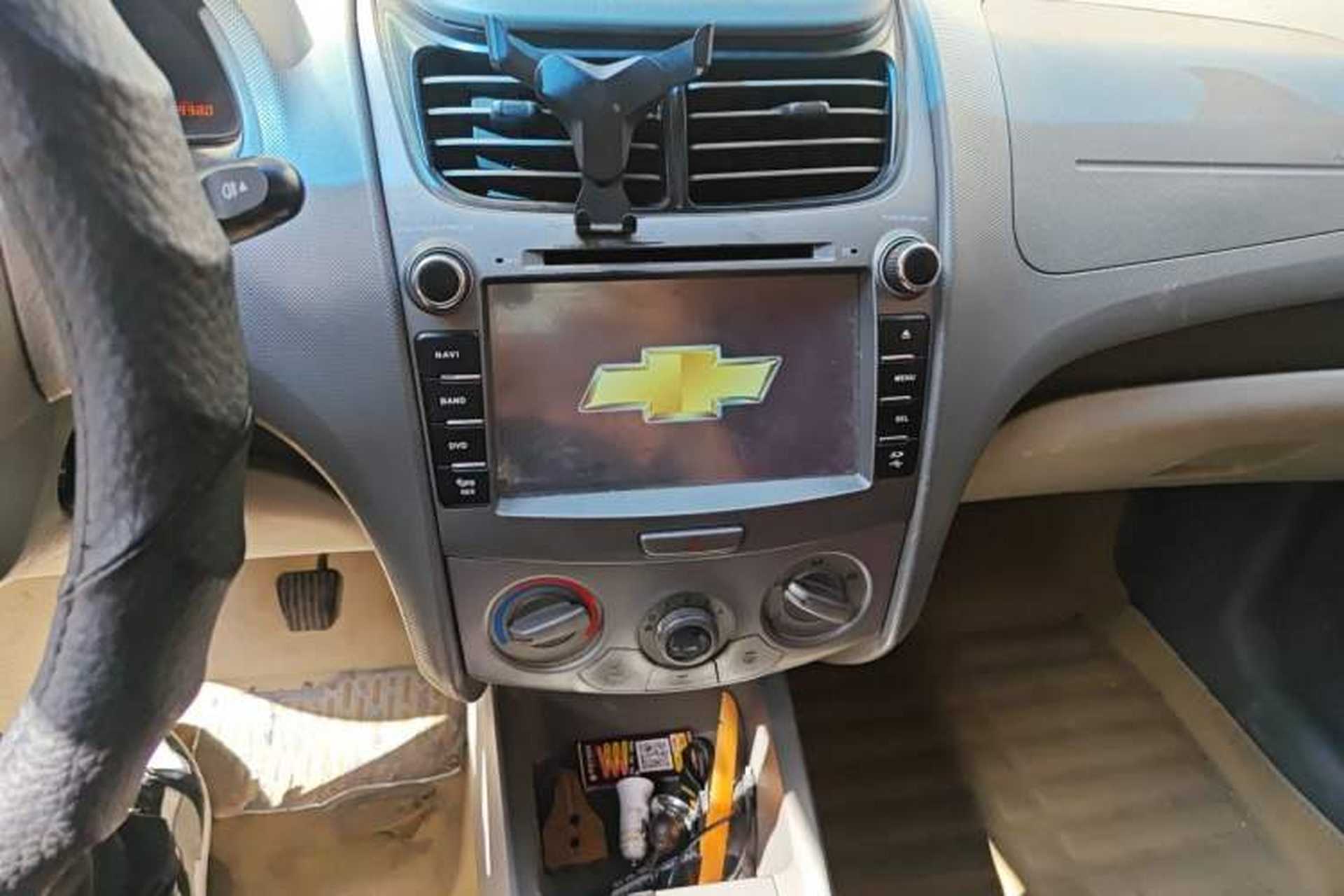 Used Chevrolet Sail 2013 Sedan 1.4L Manual Ideal Edition Audio And AC Panel