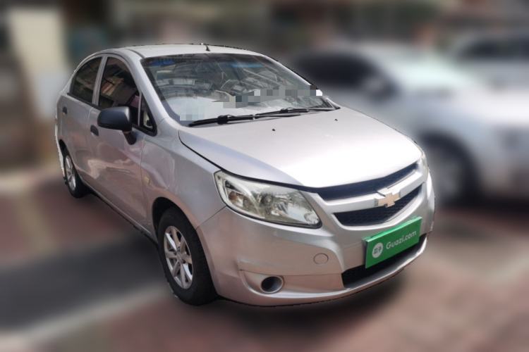 Used Chevrolet Sail 2013 Sedan 1.2L Manual Warm Edition Front Right 45 Deg