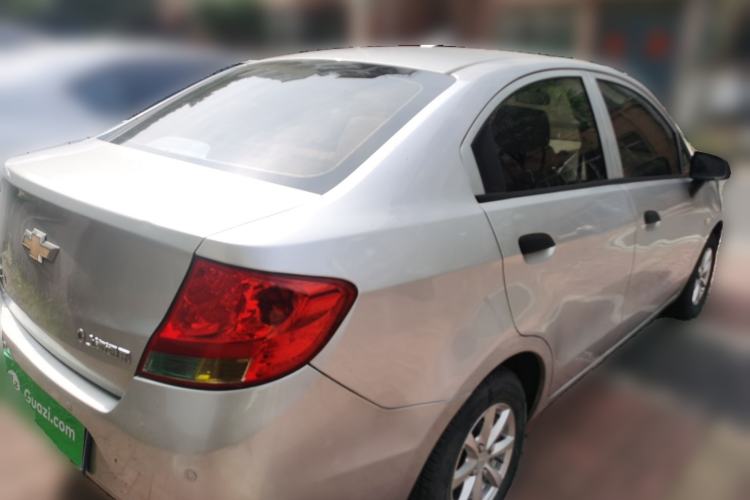 Used Chevrolet Sail 2013 Sedan 1.2L Manual Warm Edition Rear Right 45 Deg