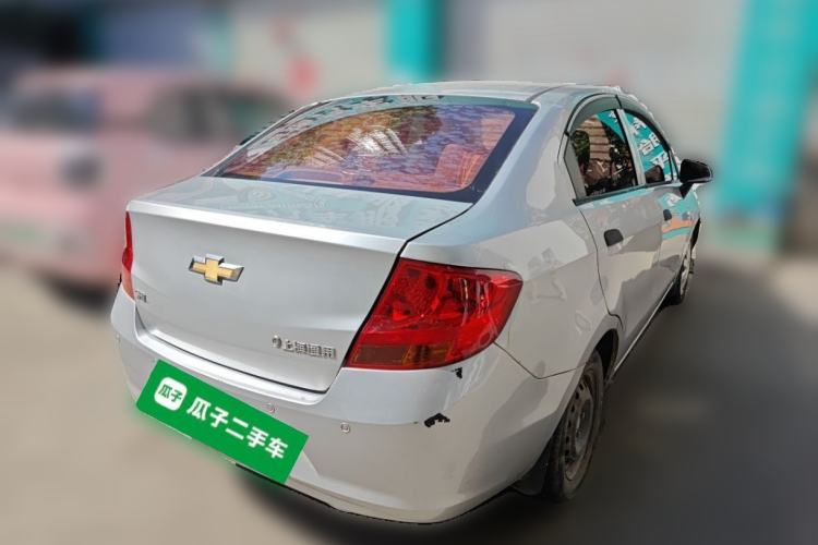 Used Chevrolet Sail 2013 Sedan 1.4L Manual Ideal Edition Rear Right 45 Deg
