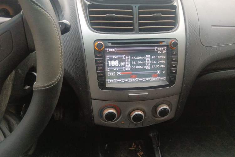 Used Chevrolet Sail 2013 Sedan 1.2L Manual Fashionable Happiness Edition Audio And AC Panel