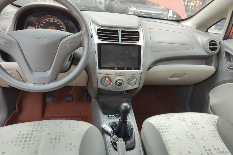 Used Chevrolet Sail 2013 Sedan 1.2L Manual Fashionable Happiness Edition Audio And AC Panel