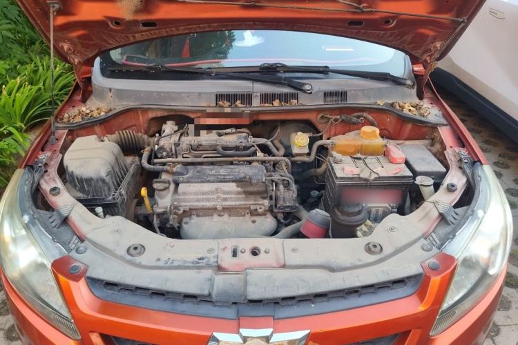 Used Chevrolet Sail 2013 Sedan 1.2L Manual Fashionable Happiness Edition Engine Bay