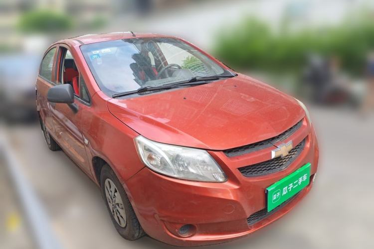 Used Chevrolet Sail 2013 Sedan 1.2L Manual Warm Edition Front Right 45 Deg