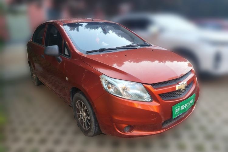 Used Chevrolet Sail 2013 Sedan 1.2L Manual Fashionable Happiness Edition Front Right 45 Deg