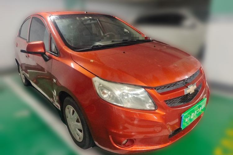 Used Chevrolet Sail 2013 Sedan 1.4L Manual Happiness Edition II Front Right 45 Deg