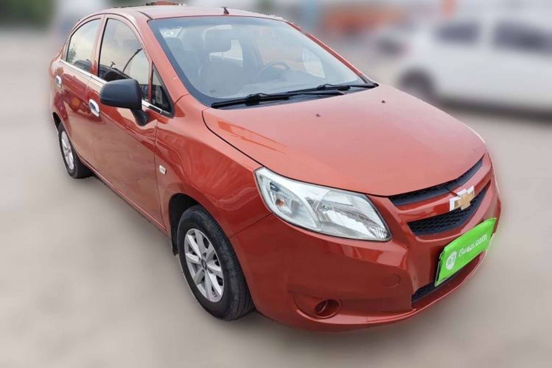 Used Chevrolet Sail 2013 Sedan 1.2L Manual Fashionable Happiness Edition Front Right 45 Deg