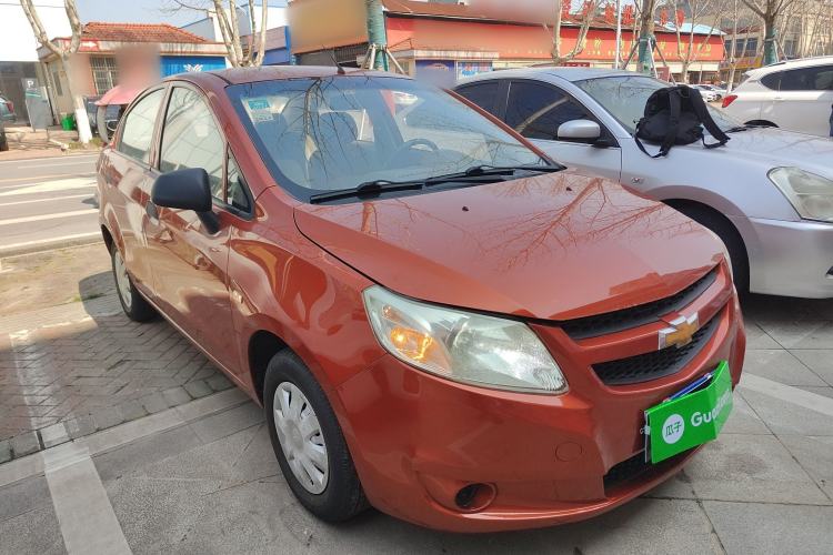 Used Chevrolet Sail 2013 Sedan 1.2L Manual Fashionable Happiness Edition Front Right 45 Deg