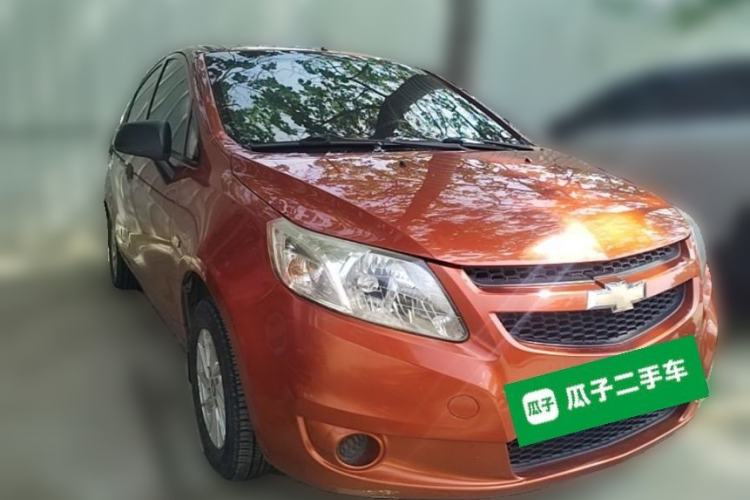 Used Chevrolet Sail 2013 Sedan 1.2L Manual Fashionable Happiness Edition Front Right 45 Deg