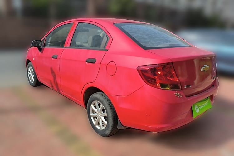 Used Chevrolet Sail 2013 Sedan 1.2L Manual Warm Edition Rear Left 45 Deg