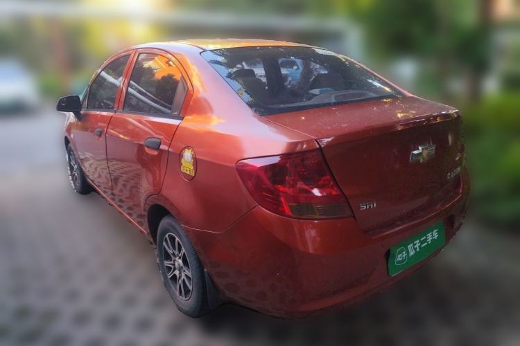 Used Chevrolet Sail 2013 Sedan 1.2L Manual Fashionable Happiness Edition Rear Left 45 Deg