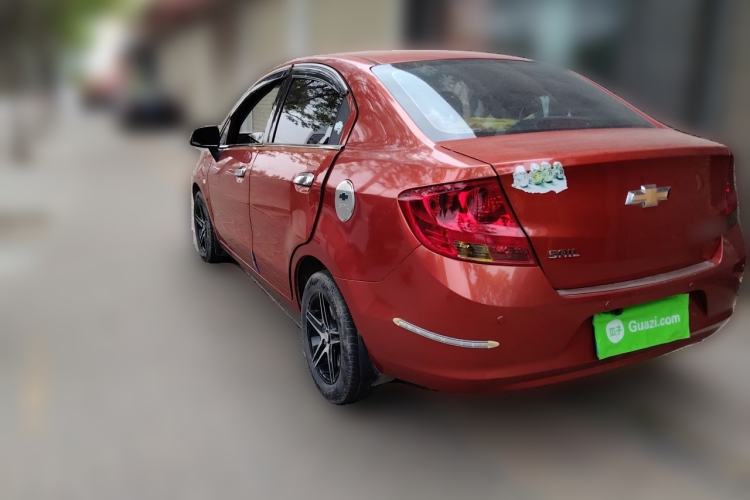 Used Chevrolet Sail 2013 Sedan 1.2L Manual Fashionable Happiness Edition Rear Left 45 Deg