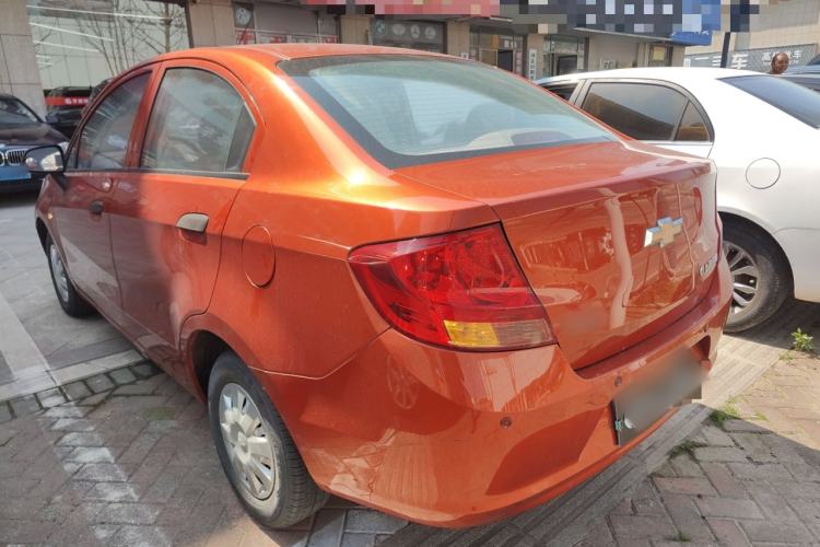 Used Chevrolet Sail 2013 Sedan 1.2L Manual Fashionable Happiness Edition Rear Left 45 Deg