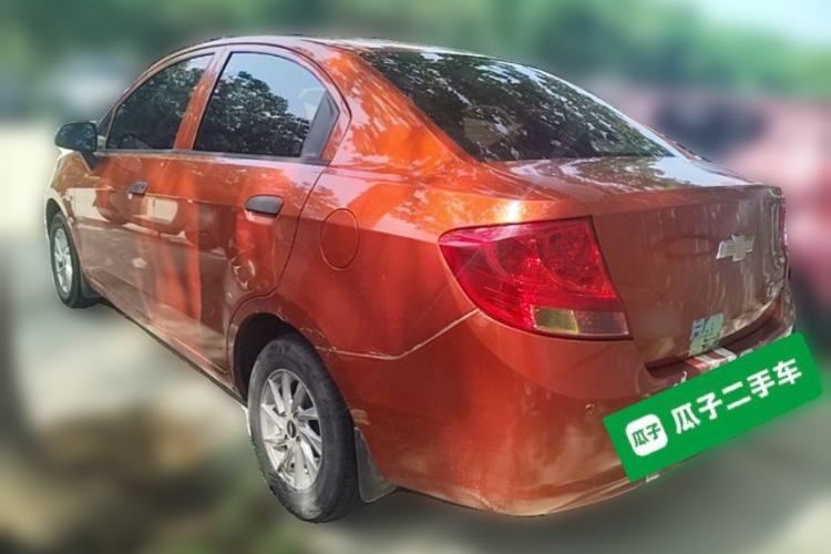 Used Chevrolet Sail 2013 Sedan 1.2L Manual Fashionable Happiness Edition Rear Left 45 Deg