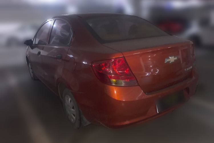 Used Chevrolet Sail 2013 Sedan 1.2L Manual Warm Edition Rear Left 45 Deg