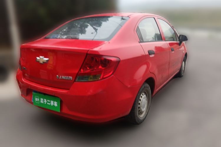 Used Chevrolet Sail 2013 Sedan 1.2L Manual Fashionable Happiness Edition Rear Right 45 Deg