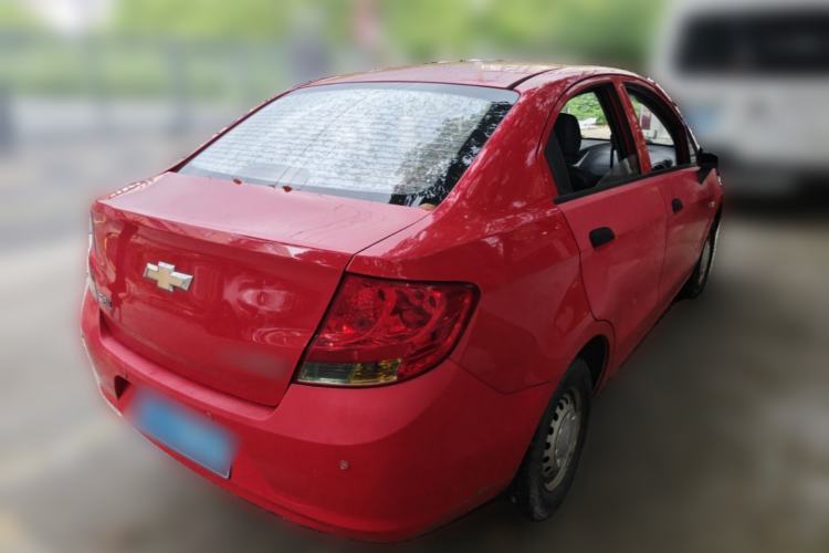 Used Chevrolet Sail 2013 Sedan 1.2L Manual Fashionable Happiness Edition Rear Right 45 Deg