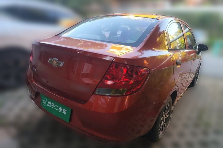 Used Chevrolet Sail 2013 Sedan 1.2L Manual Fashionable Happiness Edition Rear Right 45 Deg