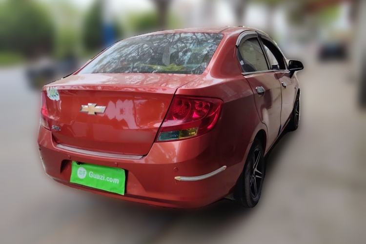 Used Chevrolet Sail 2013 Sedan 1.2L Manual Fashionable Happiness Edition Rear Right 45 Deg