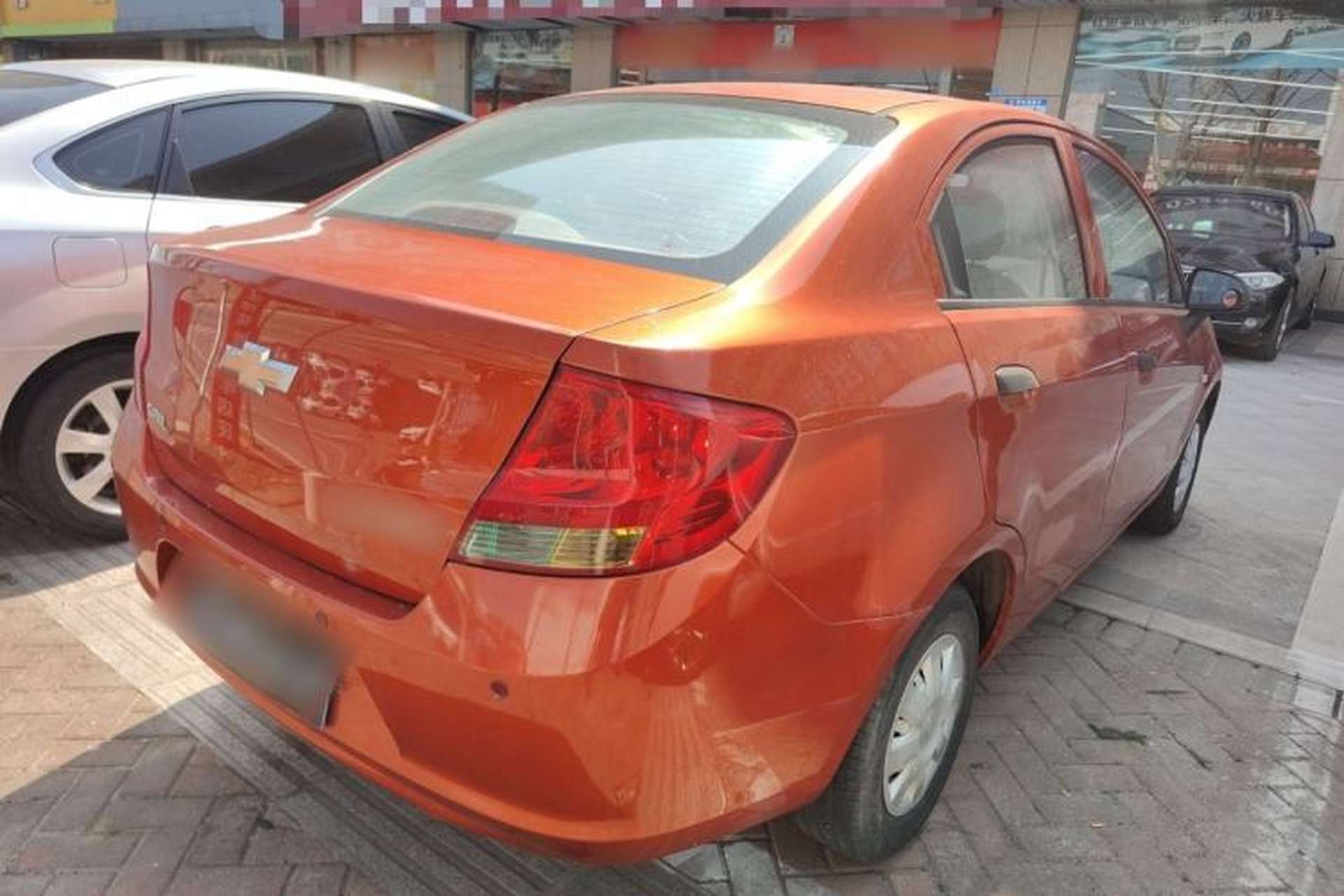 Used Chevrolet Sail 2013 Sedan 1.2L Manual Fashionable Happiness Edition Rear Right 45 Deg