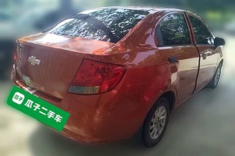 Used Chevrolet Sail 2013 Sedan 1.2L Manual Fashionable Happiness Edition Rear Right 45 Deg