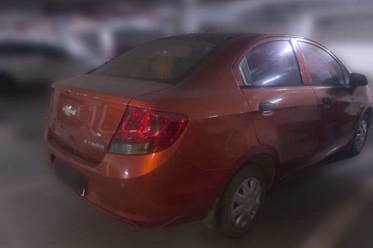 Used Chevrolet Sail 2013 Sedan 1.2L Manual Warm Edition Rear Right 45 Deg