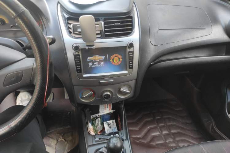 Used Chevrolet Sail 2013 Sedan 1.4L Manual Ideal Happiness Edition Audio And AC Panel