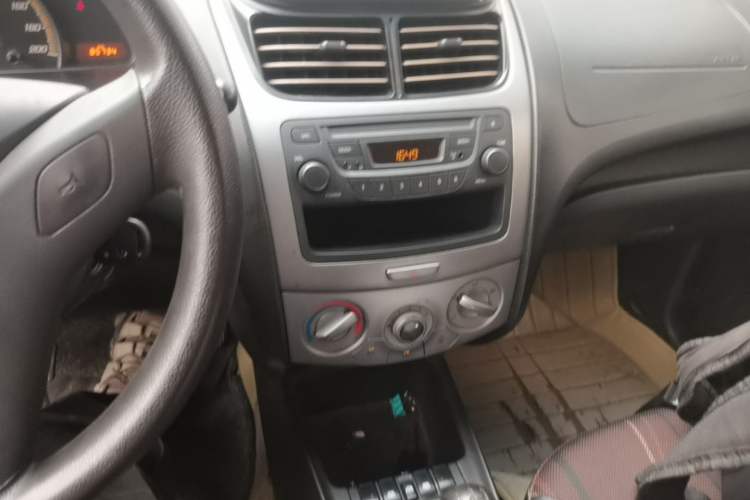 Used Chevrolet Sail 2013 Sedan 1.4L Manual Ideal Happiness Edition Audio And AC Panel
