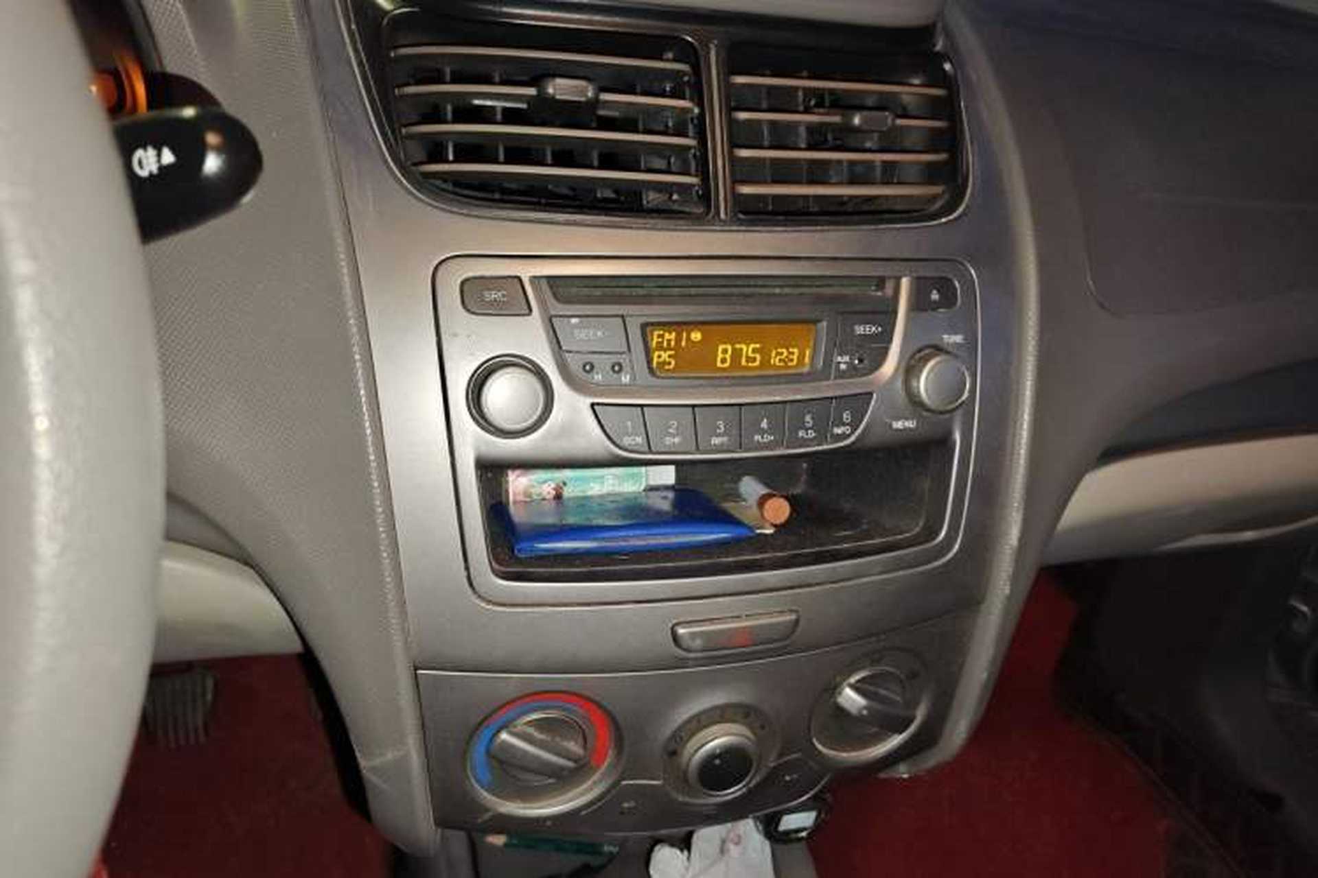 Used Chevrolet Sail 2013 Sedan 1.4L Manual Happiness Edition II Audio And AC Panel