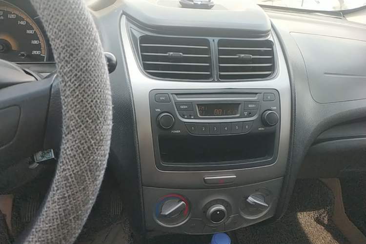 Used Chevrolet Sail 2013 Sedan 1.2L Manual Fashionable Happiness Edition Audio And AC Panel